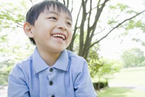 boy smiling with dental sealants